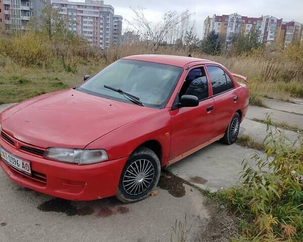 Червоний Міцубісі Lancer, об'ємом двигуна 1.3 л та пробігом 290 тис. км за 750 $, фото 3 на Automoto.ua