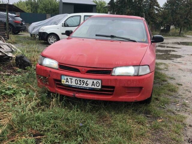 Червоний Міцубісі Lancer, об'ємом двигуна 1.5 л та пробігом 258 тис. км за 1100 $, фото 1 на Automoto.ua