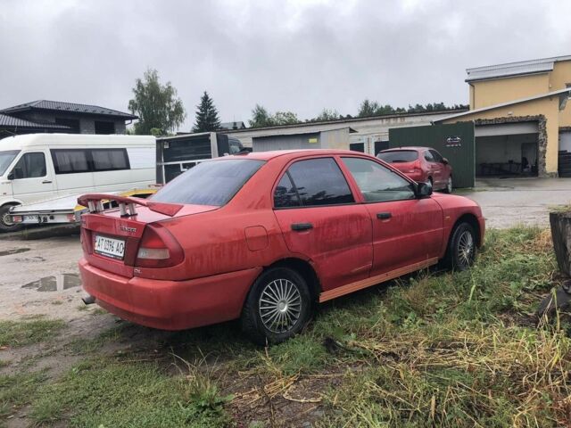 Червоний Міцубісі Lancer, об'ємом двигуна 1.5 л та пробігом 258 тис. км за 1100 $, фото 3 на Automoto.ua