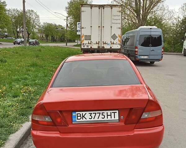 Червоний Міцубісі Lancer, об'ємом двигуна 1.3 л та пробігом 336 тис. км за 2900 $, фото 17 на Automoto.ua