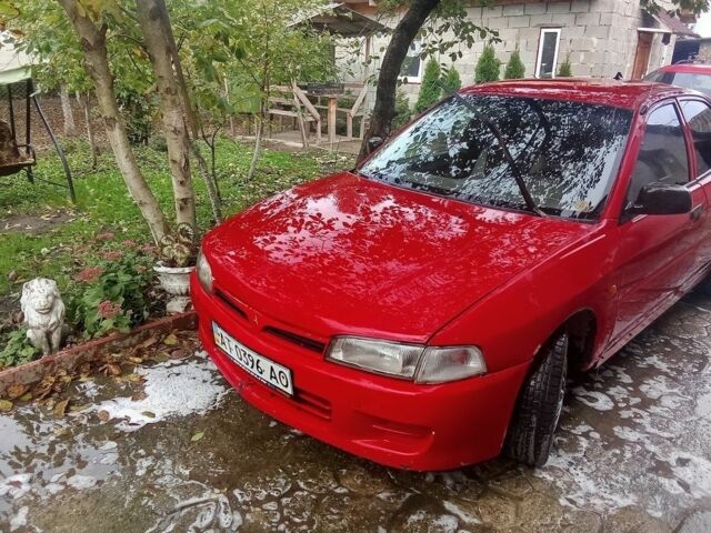 Червоний Міцубісі Lancer, об'ємом двигуна 1.3 л та пробігом 3 тис. км за 1079 $, фото 2 на Automoto.ua