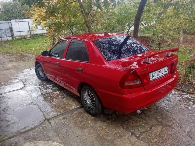 Червоний Міцубісі Lancer, об'ємом двигуна 1.3 л та пробігом 3 тис. км за 1079 $, фото 1 на Automoto.ua