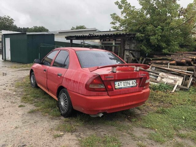Червоний Міцубісі Lancer, об'ємом двигуна 1.5 л та пробігом 258 тис. км за 1100 $, фото 2 на Automoto.ua