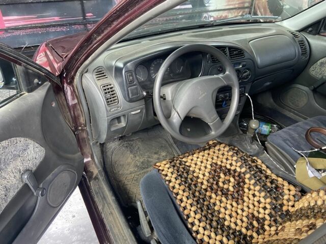 Червоний Міцубісі Lancer, об'ємом двигуна 1.3 л та пробігом 275 тис. км за 1500 $, фото 7 на Automoto.ua
