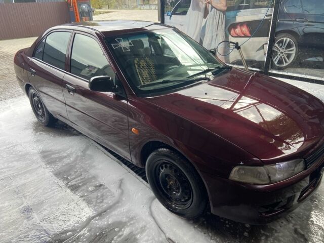 Червоний Міцубісі Lancer, об'ємом двигуна 1.3 л та пробігом 275 тис. км за 1500 $, фото 3 на Automoto.ua