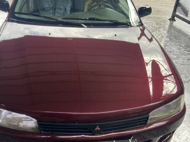 Червоний Міцубісі Lancer, об'ємом двигуна 1.3 л та пробігом 275 тис. км за 1500 $, фото 2 на Automoto.ua