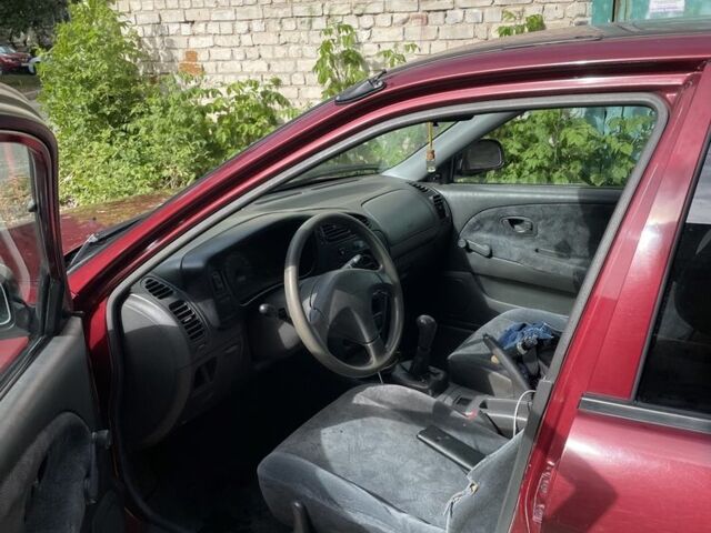 Червоний Міцубісі Lancer, об'ємом двигуна 1.3 л та пробігом 250 тис. км за 2000 $, фото 4 на Automoto.ua