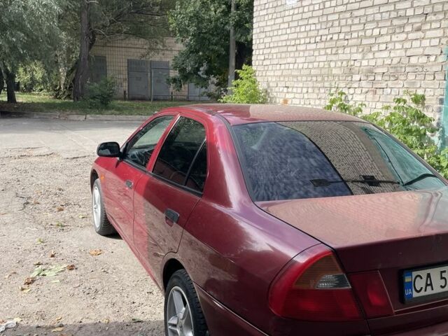 Червоний Міцубісі Lancer, об'ємом двигуна 1.3 л та пробігом 250 тис. км за 2000 $, фото 3 на Automoto.ua