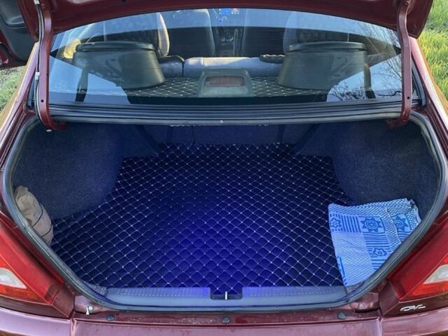 Красный Мицубиси Лансер, объемом двигателя 1.3 л и пробегом 182 тыс. км за 3000 $, фото 6 на Automoto.ua