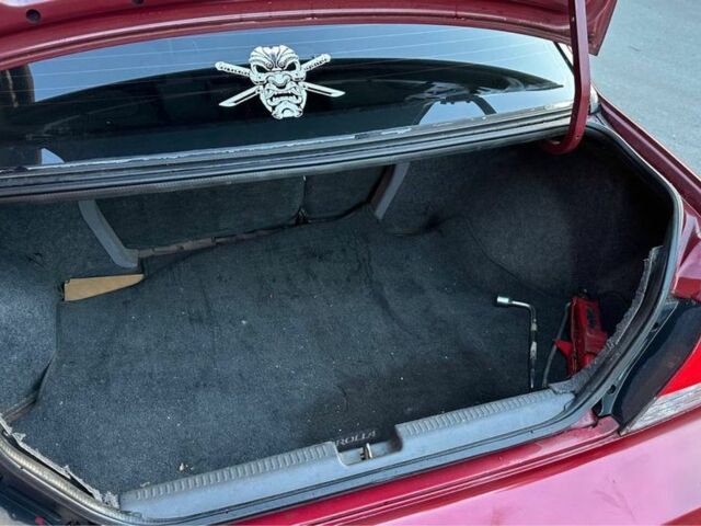 Красный Мицубиси Лансер, объемом двигателя 2 л и пробегом 350 тыс. км за 3399 $, фото 6 на Automoto.ua