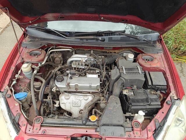Міцубісі Lancer 2003 у Харкові на Automoto.ua Червоний Міцубісі Lancer, об'ємом двигуна 1.6 л та пробігом 302 тис. км за 3800 $, фото 8 на Automoto.ua