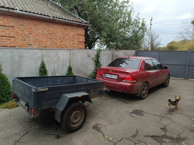 Міцубісі Lancer 2003 у Харкові на Automoto.ua Червоний Міцубісі Lancer, об'ємом двигуна 1.6 л та пробігом 302 тис. км за 3800 $, фото 16 на Automoto.ua