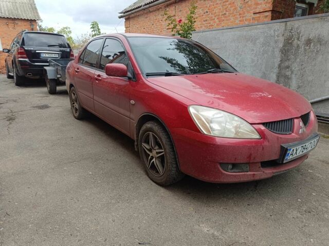 Міцубісі Lancer 2003 у Харкові на Automoto.ua Червоний Міцубісі Lancer, об'ємом двигуна 1.6 л та пробігом 302 тис. км за 3800 $, фото 15 на Automoto.ua