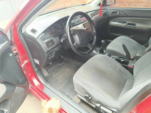 Міцубісі Lancer 2003 у Харкові на Automoto.ua Червоний Міцубісі Lancer, об'ємом двигуна 1.6 л та пробігом 302 тис. км за 3800 $, фото 10 на Automoto.ua