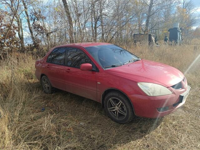 Міцубісі Lancer 2003 у Харкові на Automoto.ua Червоний Міцубісі Lancer, об'ємом двигуна 1.6 л та пробігом 302 тис. км за 3800 $, фото 1 на Automoto.ua