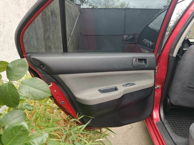 Міцубісі Lancer 2003 у Харкові на Automoto.ua Червоний Міцубісі Lancer, об'ємом двигуна 1.6 л та пробігом 302 тис. км за 3800 $, фото 4 на Automoto.ua