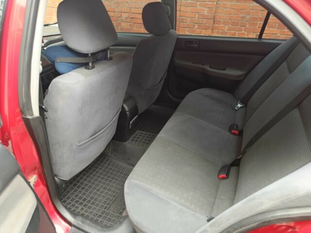 Міцубісі Lancer 2003 у Харкові на Automoto.ua Червоний Міцубісі Lancer, об'ємом двигуна 1.6 л та пробігом 302 тис. км за 3800 $, фото 5 на Automoto.ua