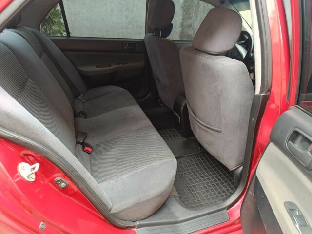 Міцубісі Lancer 2003 у Харкові на Automoto.ua Червоний Міцубісі Lancer, об'ємом двигуна 1.6 л та пробігом 302 тис. км за 3800 $, фото 13 на Automoto.ua