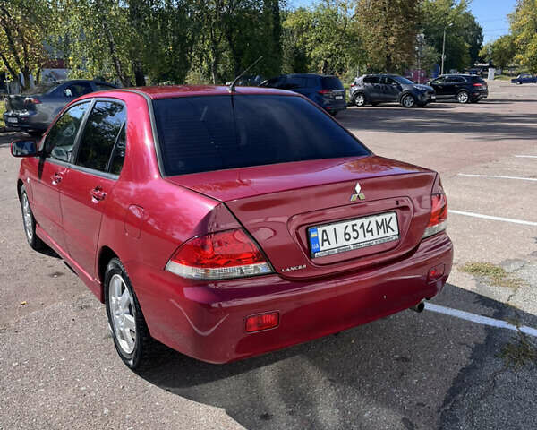 Червоний Міцубісі Lancer, об'ємом двигуна 1.58 л та пробігом 300 тис. км за 3200 $, фото 2 на Automoto.ua