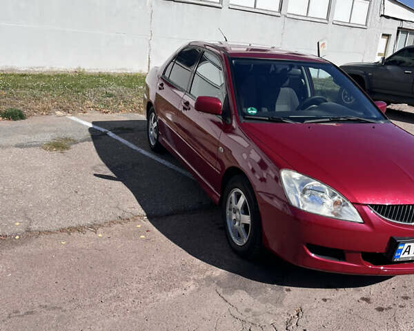 Червоний Міцубісі Lancer, об'ємом двигуна 1.58 л та пробігом 300 тис. км за 3200 $, фото 4 на Automoto.ua
