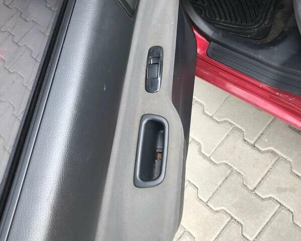 Красный Мицубиси Лансер, объемом двигателя 1.6 л и пробегом 224 тыс. км за 5500 $, фото 9 на Automoto.ua