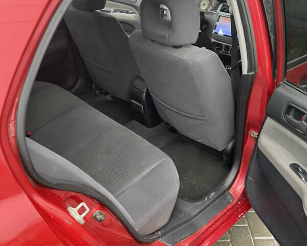 Червоний Міцубісі Lancer, об'ємом двигуна 1.58 л та пробігом 350 тис. км за 3600 $, фото 7 на Automoto.ua