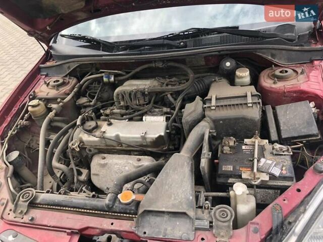 Красный Мицубиси Лансер, объемом двигателя 1.6 л и пробегом 224 тыс. км за 5500 $, фото 4 на Automoto.ua