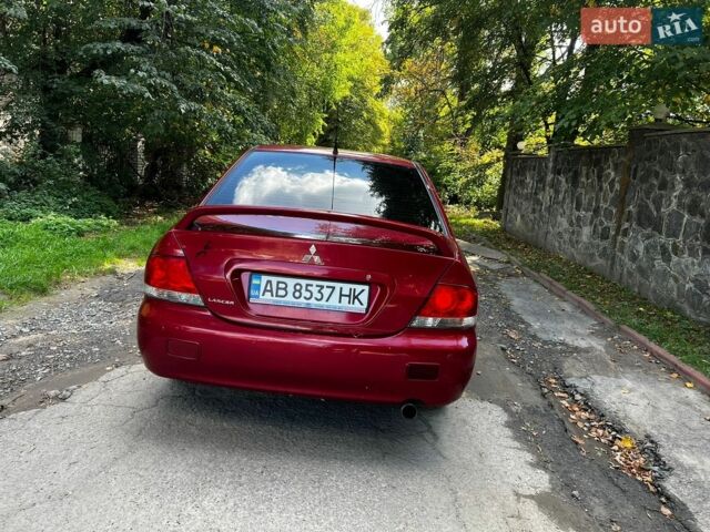 Красный Мицубиси Лансер, объемом двигателя 1.58 л и пробегом 281 тыс. км за 2750 $, фото 10 на Automoto.ua