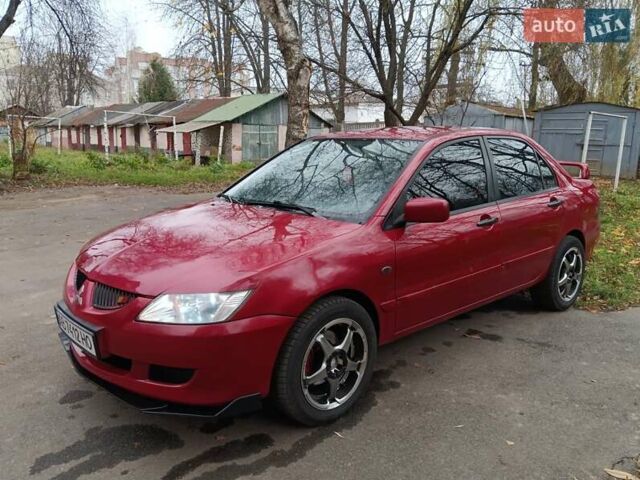 Червоний Міцубісі Lancer, об'ємом двигуна 1.3 л та пробігом 223 тис. км за 4250 $, фото 19 на Automoto.ua