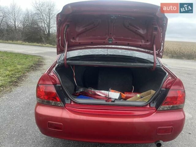Красный Мицубиси Лансер, объемом двигателя 1.3 л и пробегом 250 тыс. км за 3450 $, фото 6 на Automoto.ua
