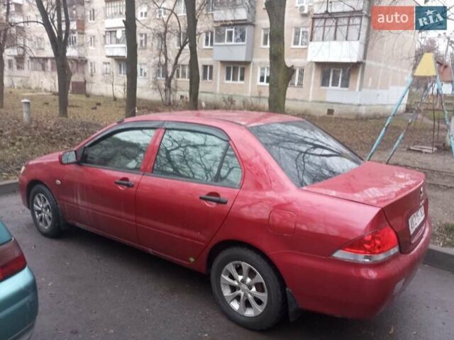 Червоний Міцубісі Lancer, об'ємом двигуна 1.3 л та пробігом 250 тис. км за 4300 $, фото 5 на Automoto.ua