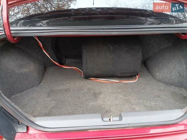 Червоний Міцубісі Lancer, об'ємом двигуна 1.3 л та пробігом 223 тис. км за 4250 $, фото 21 на Automoto.ua