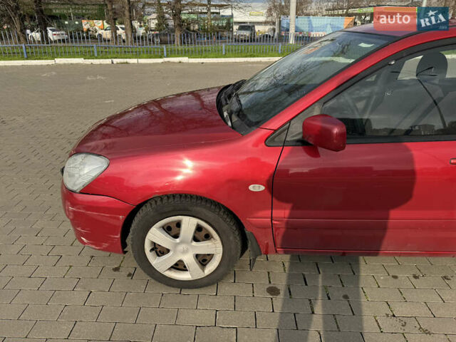 Червоний Міцубісі Lancer, об'ємом двигуна 1.58 л та пробігом 271 тис. км за 4100 $, фото 2 на Automoto.ua