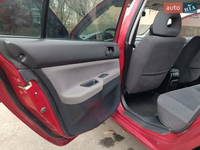 Червоний Міцубісі Lancer, об'ємом двигуна 1.3 л та пробігом 223 тис. км за 4250 $, фото 38 на Automoto.ua