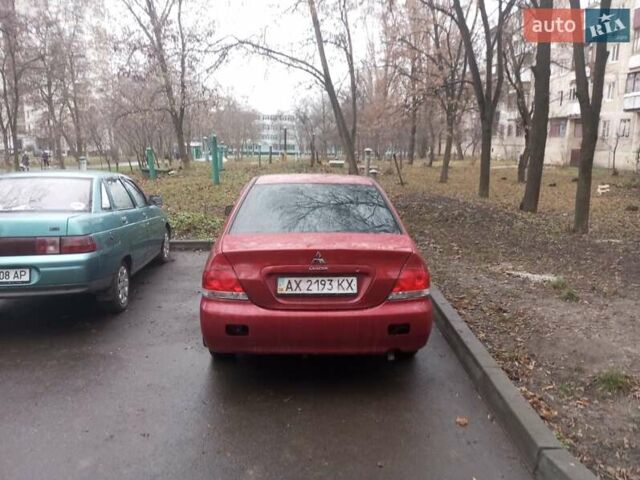 Червоний Міцубісі Lancer, об'ємом двигуна 1.3 л та пробігом 250 тис. км за 4300 $, фото 2 на Automoto.ua