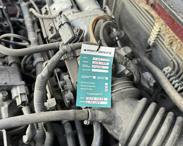 Червоний Міцубісі Lancer, об'ємом двигуна 1.58 л та пробігом 271 тис. км за 4100 $, фото 12 на Automoto.ua