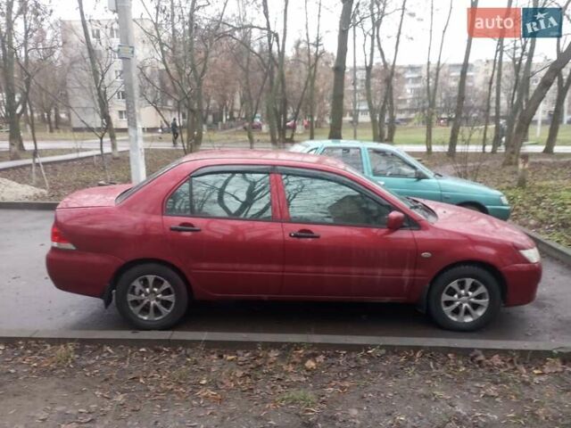 Червоний Міцубісі Lancer, об'ємом двигуна 1.3 л та пробігом 250 тис. км за 4300 $, фото 6 на Automoto.ua