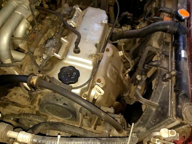 Красный Мицубиси Лансер, объемом двигателя 1.6 л и пробегом 130 тыс. км за 1500 $, фото 2 на Automoto.ua