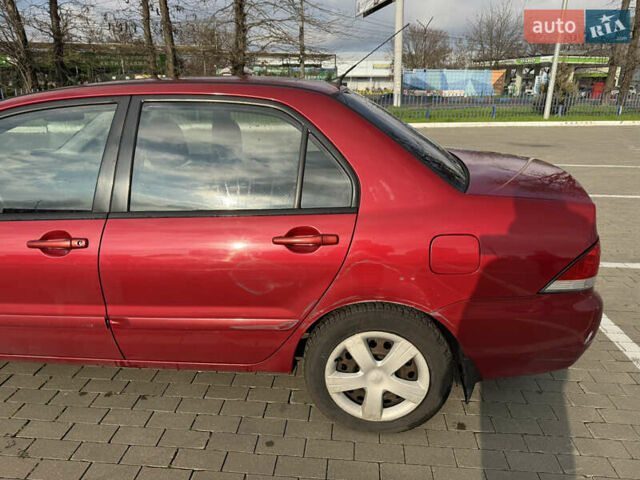 Червоний Міцубісі Lancer, об'ємом двигуна 1.58 л та пробігом 271 тис. км за 4100 $, фото 3 на Automoto.ua