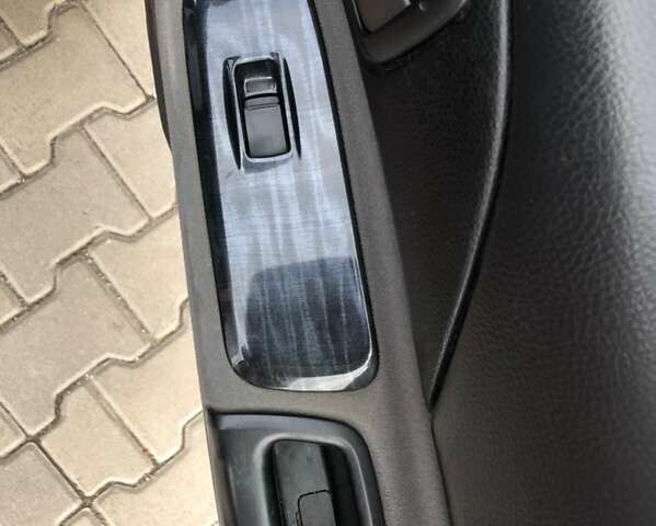 Красный Мицубиси Лансер, объемом двигателя 1.6 л и пробегом 224 тыс. км за 5500 $, фото 12 на Automoto.ua