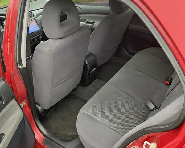 Червоний Міцубісі Lancer, об'ємом двигуна 1.58 л та пробігом 350 тис. км за 3600 $, фото 5 на Automoto.ua