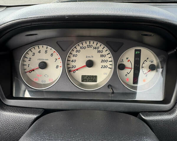 Червоний Міцубісі Lancer, об'ємом двигуна 1.58 л та пробігом 271 тис. км за 4100 $, фото 9 на Automoto.ua