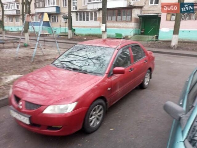 Червоний Міцубісі Lancer, об'ємом двигуна 1.3 л та пробігом 250 тис. км за 4300 $, фото 4 на Automoto.ua