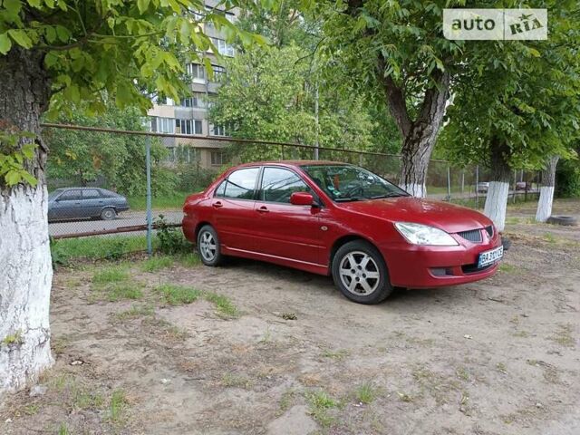 Червоний Міцубісі Lancer, об'ємом двигуна 1.58 л та пробігом 200 тис. км за 3400 $, фото 2 на Automoto.ua