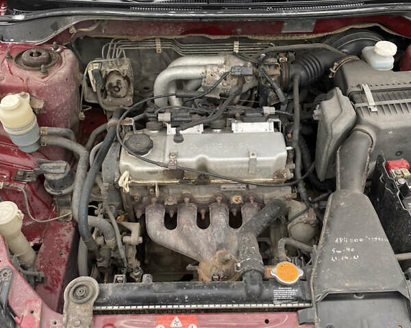 Червоний Міцубісі Lancer, об'ємом двигуна 1.58 л та пробігом 350 тис. км за 3600 $, фото 10 на Automoto.ua