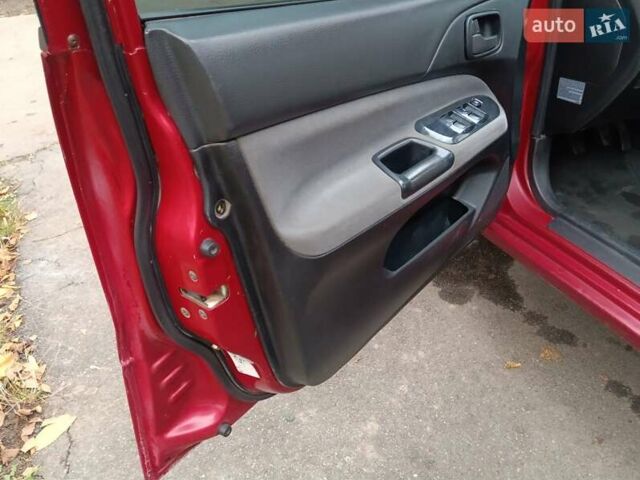 Червоний Міцубісі Lancer, об'ємом двигуна 1.3 л та пробігом 223 тис. км за 4250 $, фото 37 на Automoto.ua