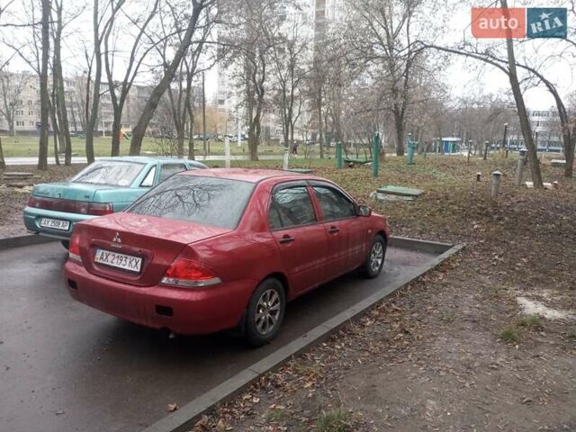 Червоний Міцубісі Lancer, об'ємом двигуна 1.3 л та пробігом 250 тис. км за 4300 $, фото 1 на Automoto.ua