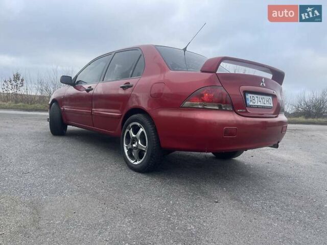 Красный Мицубиси Лансер, объемом двигателя 1.3 л и пробегом 250 тыс. км за 3450 $, фото 2 на Automoto.ua