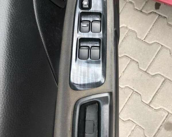 Красный Мицубиси Лансер, объемом двигателя 1.6 л и пробегом 224 тыс. км за 5500 $, фото 10 на Automoto.ua