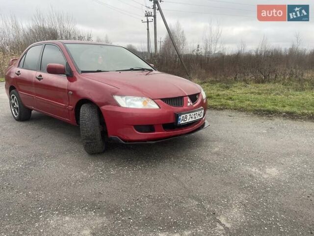 Красный Мицубиси Лансер, объемом двигателя 1.3 л и пробегом 250 тыс. км за 3450 $, фото 3 на Automoto.ua